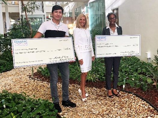 An image of Commissioner Placko with the two recipients of the Diane Glasser Memorial Scholarship